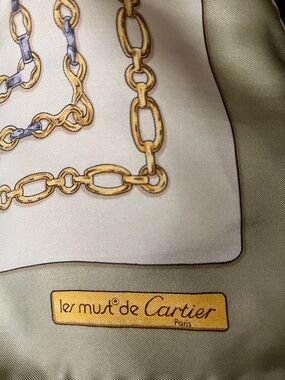 Cartier silk scarf in olive green with gold chain print